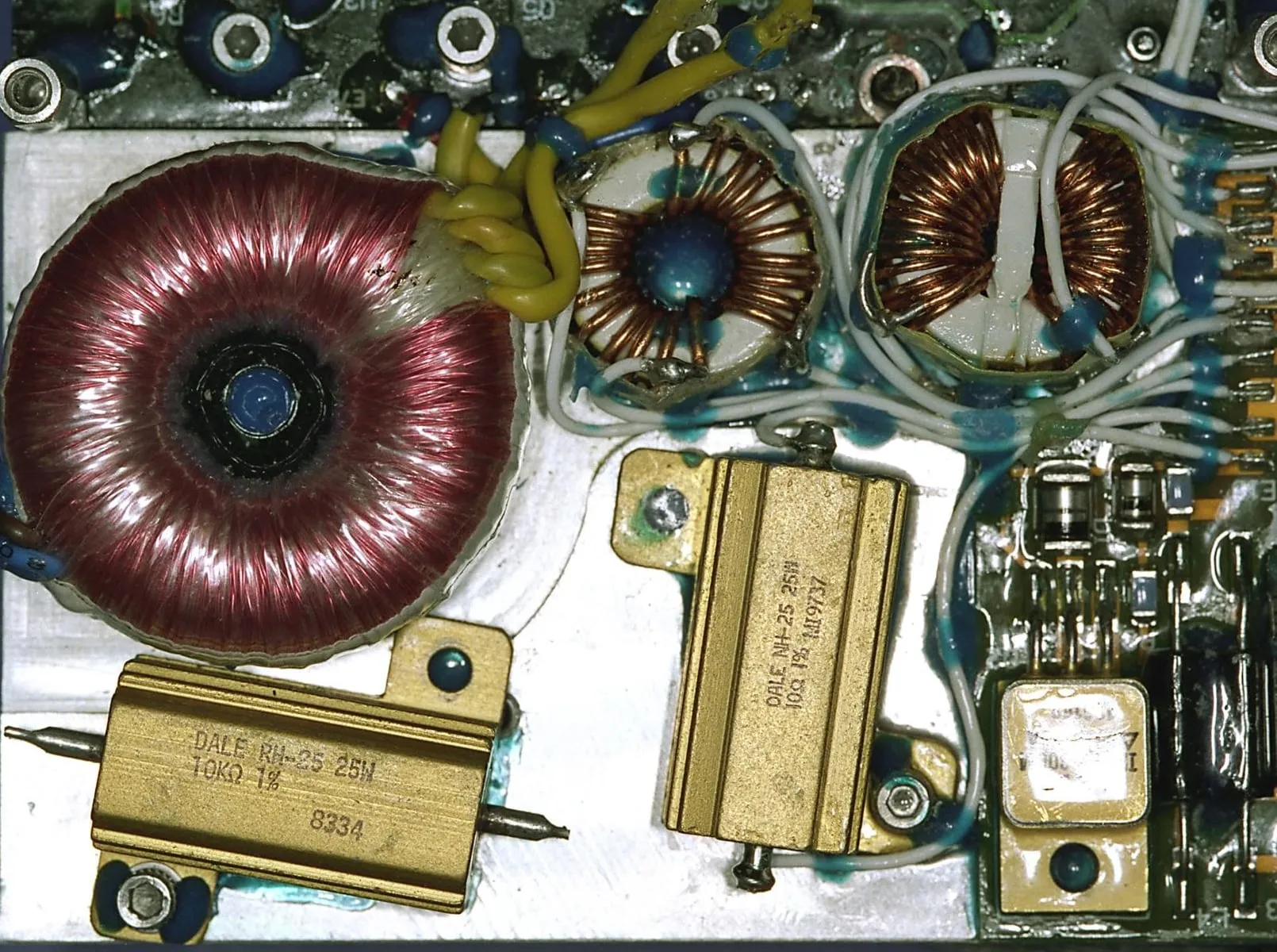 Close-up of flight power electronics: toroidal magnetics and power resistors